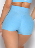 close up back profile view of a model wearing the Movement Short Shorts in Ocean Breeze color