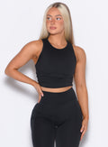 Model facing forward wearing our Muscle Scrunch Tank in Black color
