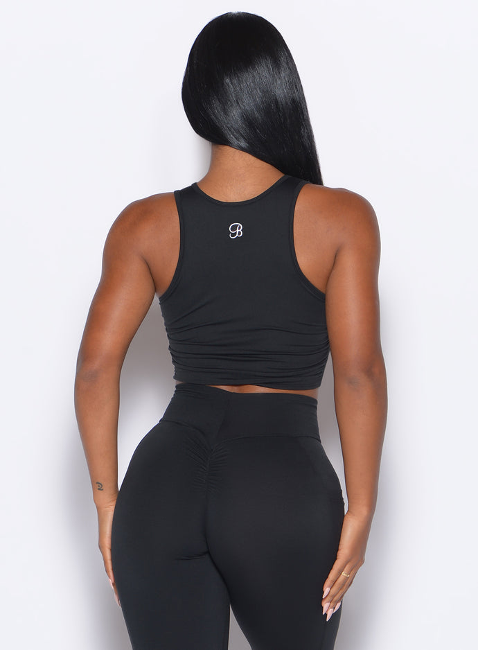 Back side close up view of model wearing the Muscle Scrunch Tank in Black color
