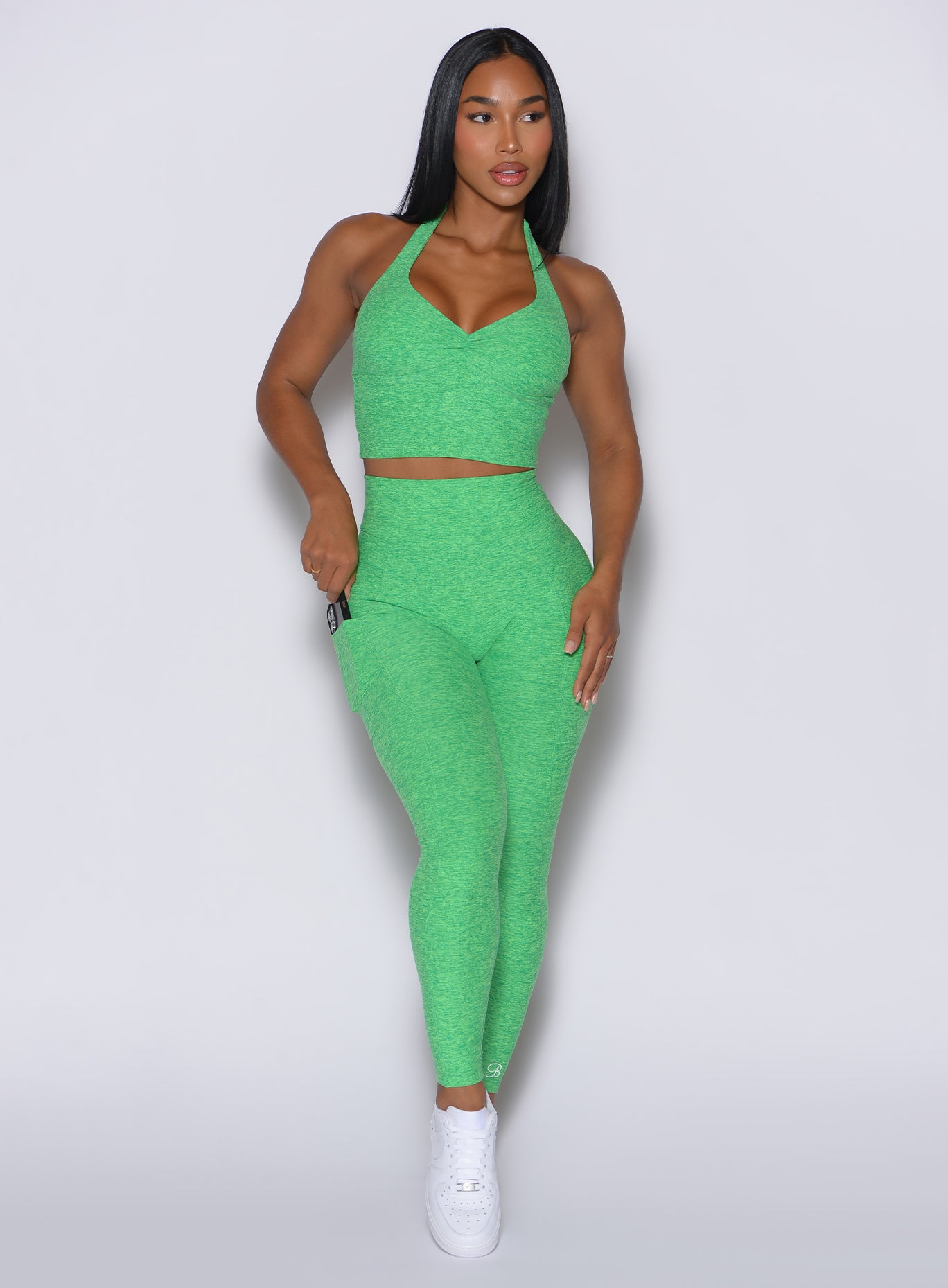 Sculpting Neon Miami Beach V Back Leggings with a double high-waist and side pockets.