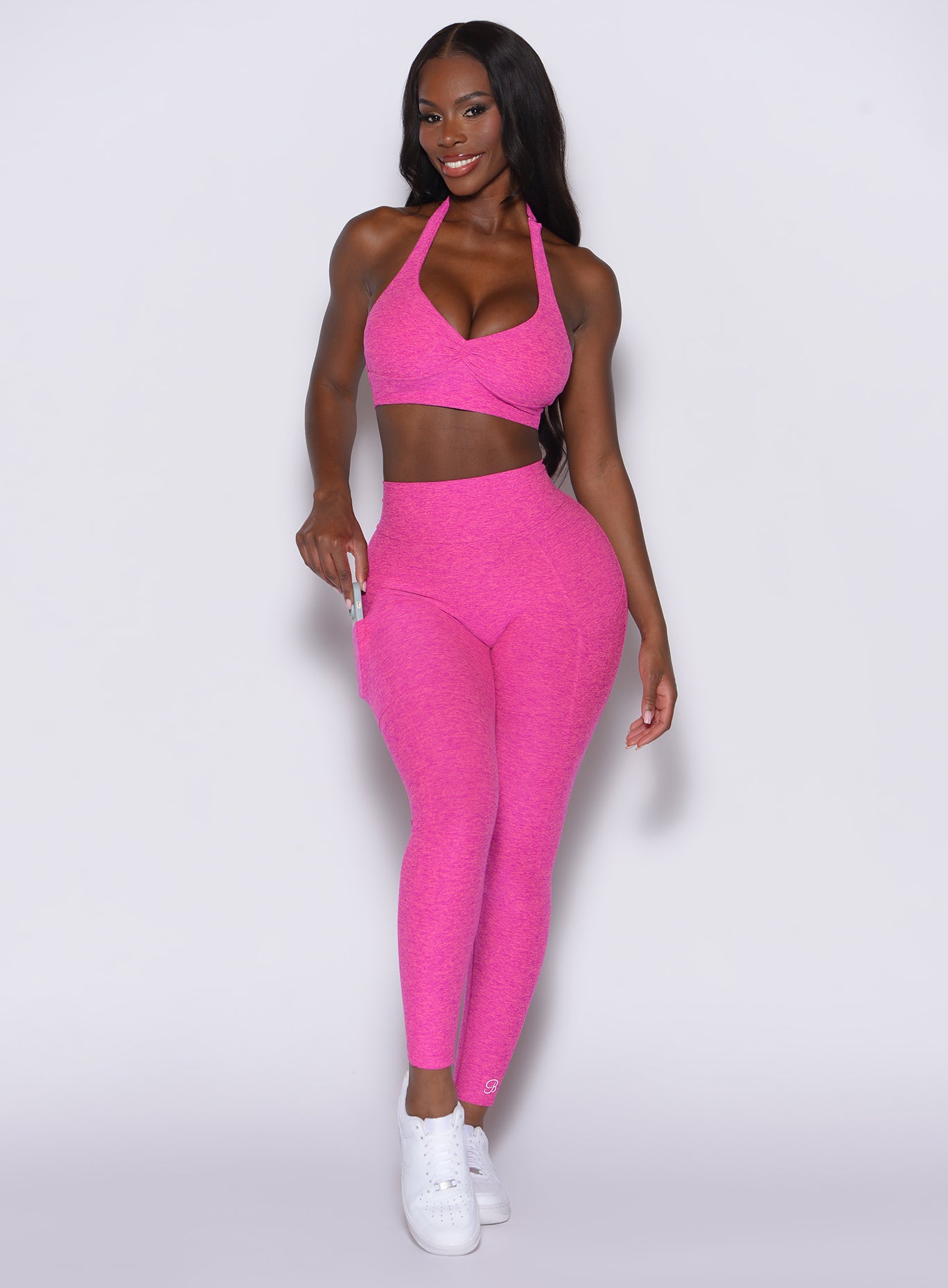 Neon Pink Sorbet V Back Leggings with a figure-flattering high-waist and side pockets for gym.