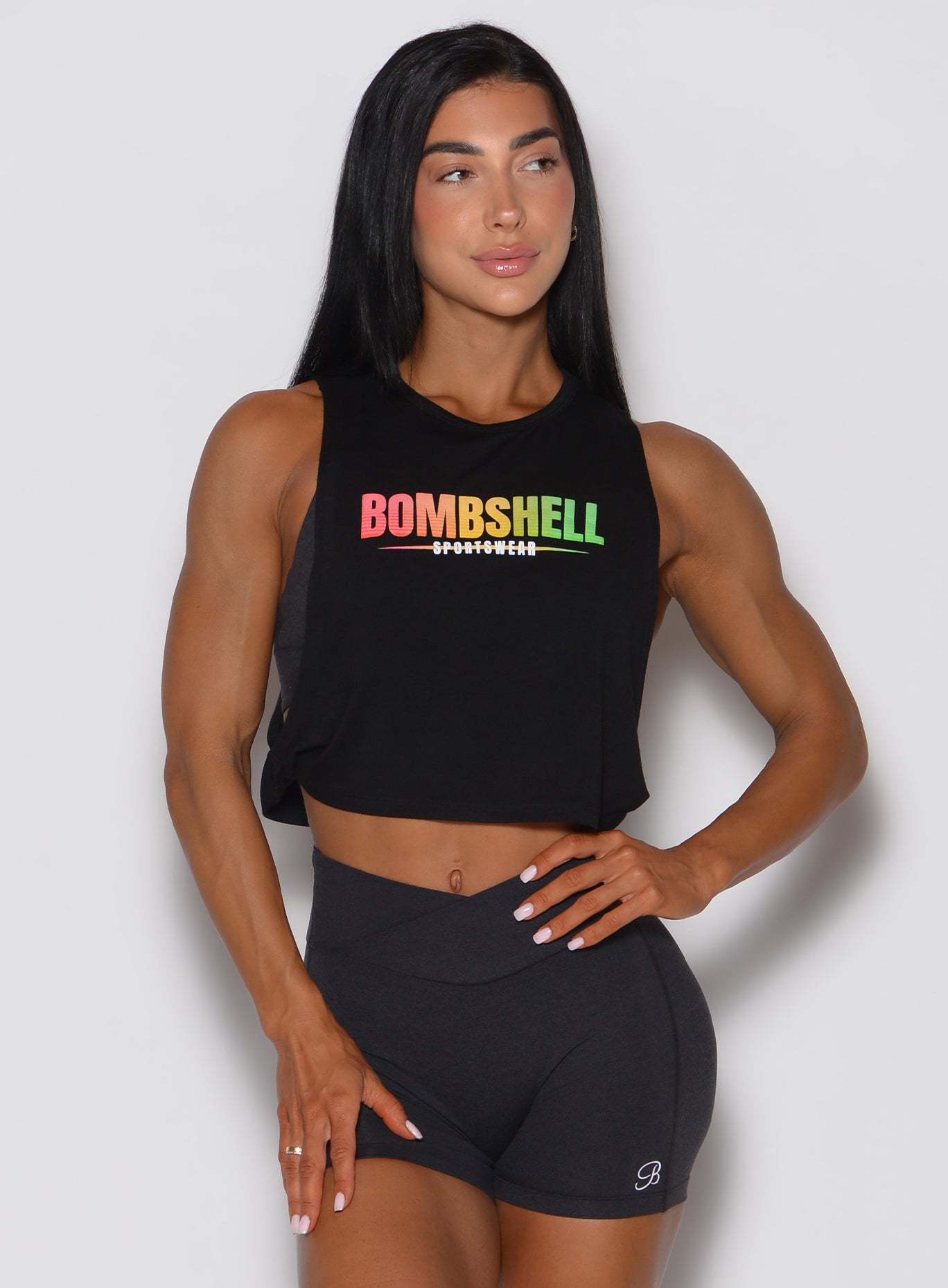 Front view of a black Ombre Logo Tank with a relaxed fit, twist hem, and open sides for ventilation.