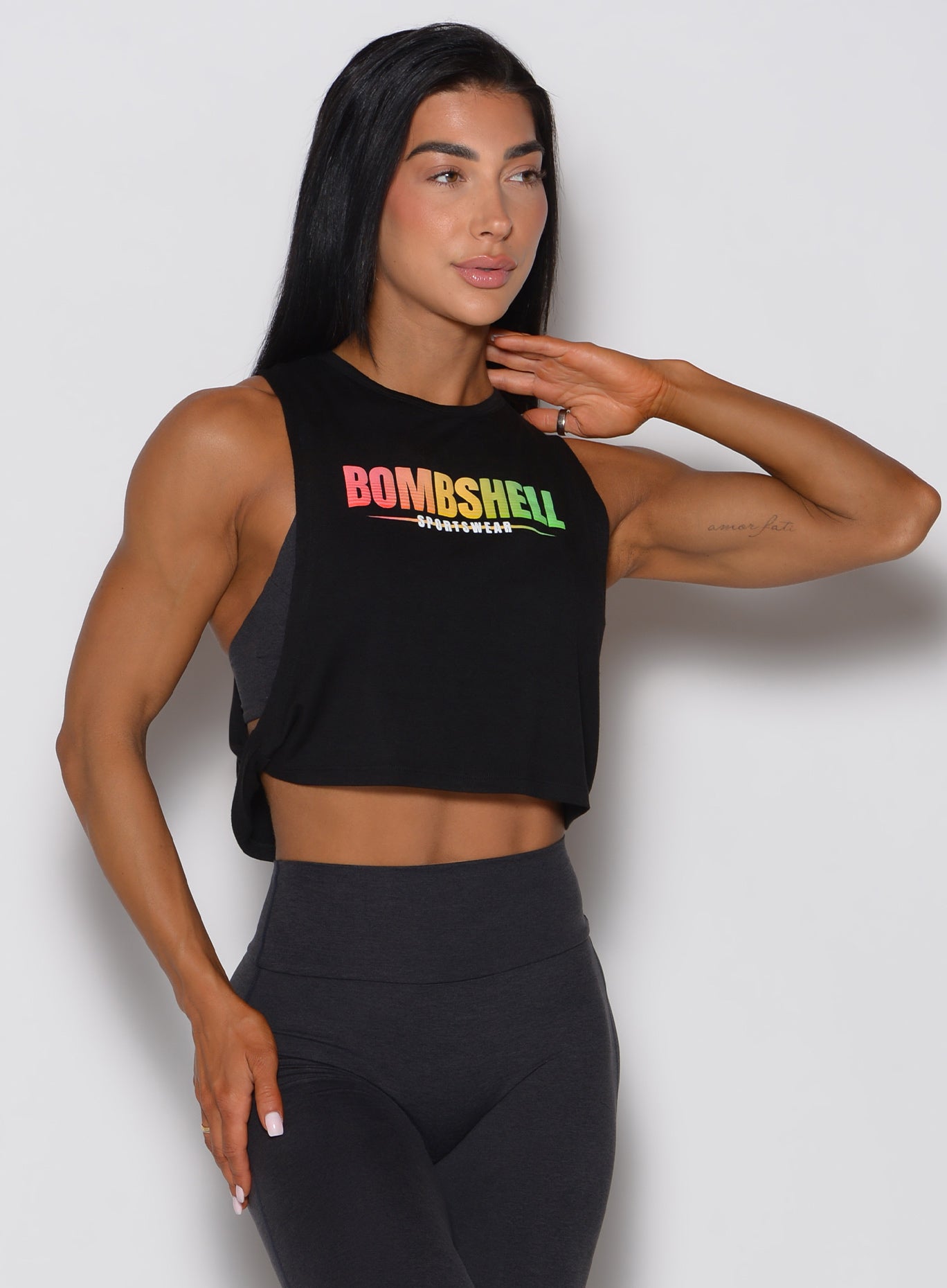 Black Ombre Logo Tank featuring a relaxed fit, open sides, and side twist detailing.