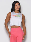 White Ombre Logo Tank featuring a relaxed fit, open sides, and side twist detail for gym workouts.