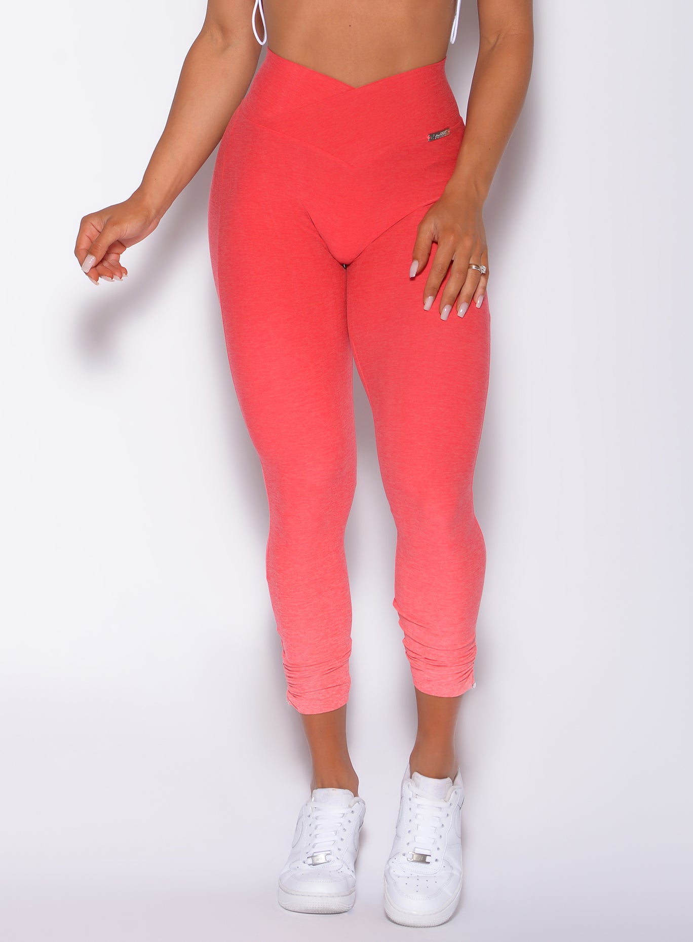 Zoomed in front view of our toggle leggings in Ombre Fiji Coral