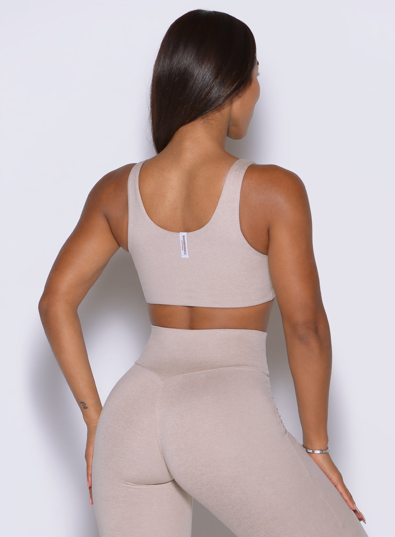 Back view reveals clean coverage and flexible support in ultra-soft heathered Taupe.