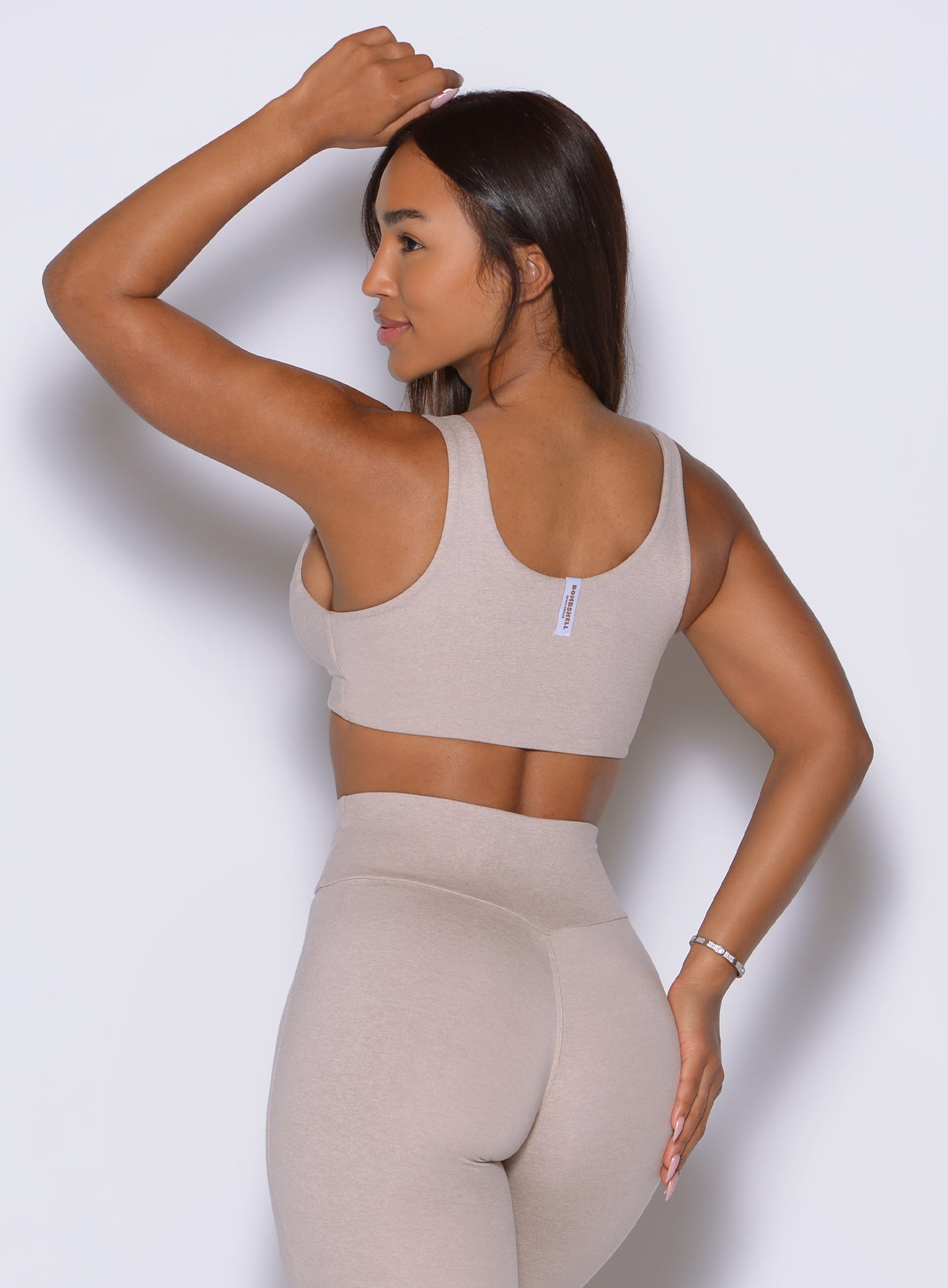 Heathered Taupe contours beautifully from behind with a secure and flattering fit.