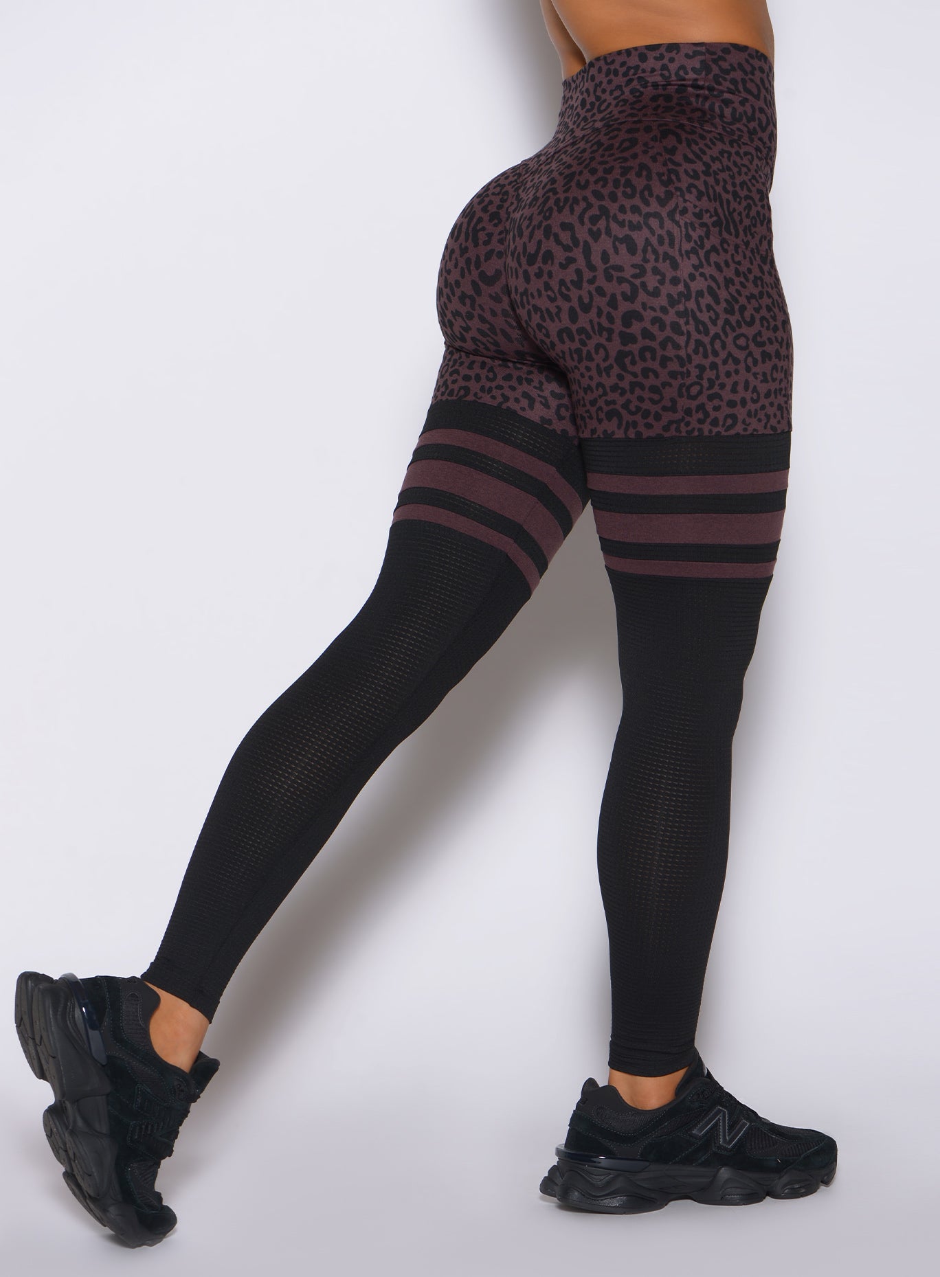 Detailed view of the internal lifting scrunch on Peppercorn Cheetah Perform Thigh-Highs