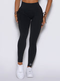 close up front view of a model wearing the PocketBoost Leggings in Black color