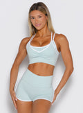 A frontal shot of a model wearing the power line bra in cool arctic color