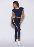 Front-right view of Power Play leggings in Cosmic blue featuring snatched support and smooth contouring