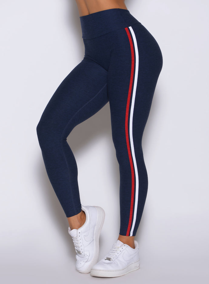 Close-up left-side view of Cosmic Blue  Power Play leggings with heathered fabric and binding details