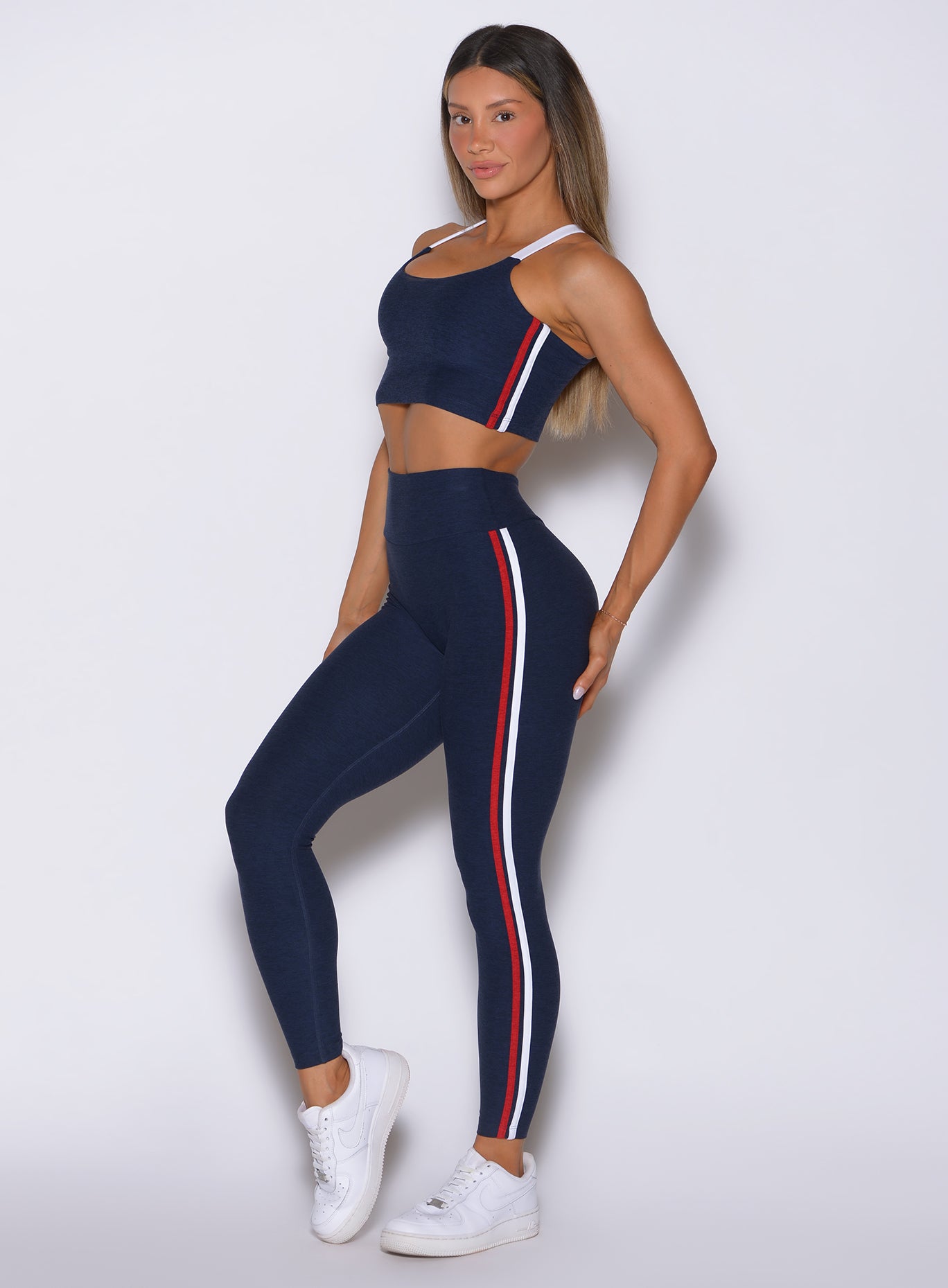 Front-left view of Cosmic Blue Power Play leggings with athletic contour shaping and soft texture