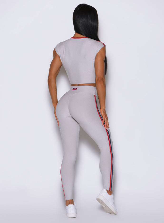 Rear profile view of Ice Power Play leggings highlighting the signature patch and athletic trim