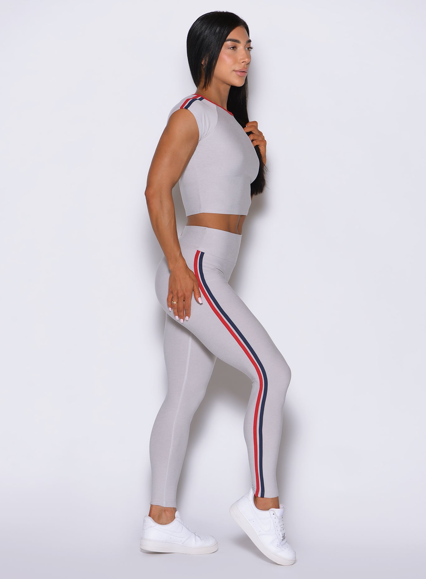 Right profile focuses on the dynamic stripe side binding running down the Ice Power Play legging