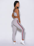Side-angle shot highlighting the bold contrast paneling on the right of the Ice Power Play legging