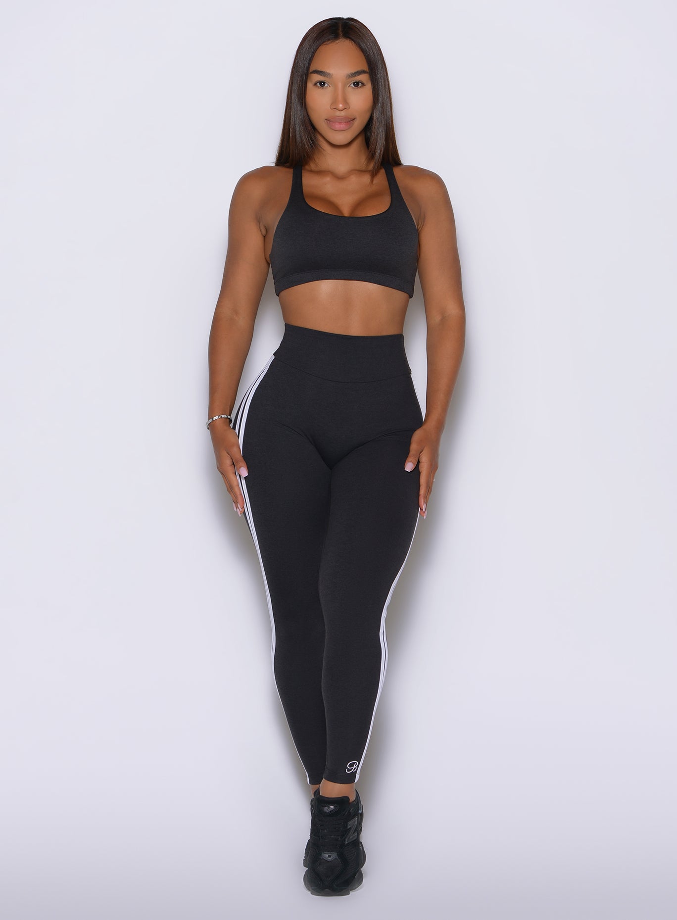 Bold double stripes bring a signature sporty edge to the sleek black Power Play design