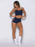 Angled view of the Power Play shorts in cosmic blue, blending high-performance support with sleek style
