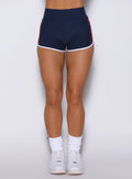 front view of the Cosmic Blue Power Play Shorts emphasizing stay-put waistband and sporty silhouette