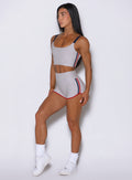  Side-angled view of Power Play shorts in Ice featuring a smooth and body-hugging fit