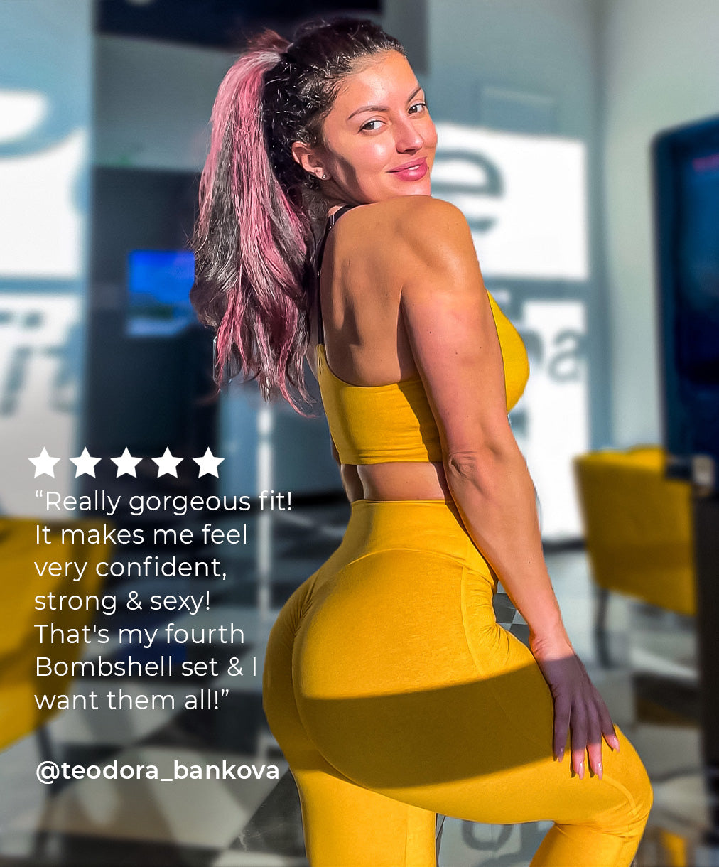 Girl in yellow gym set posing for a photo