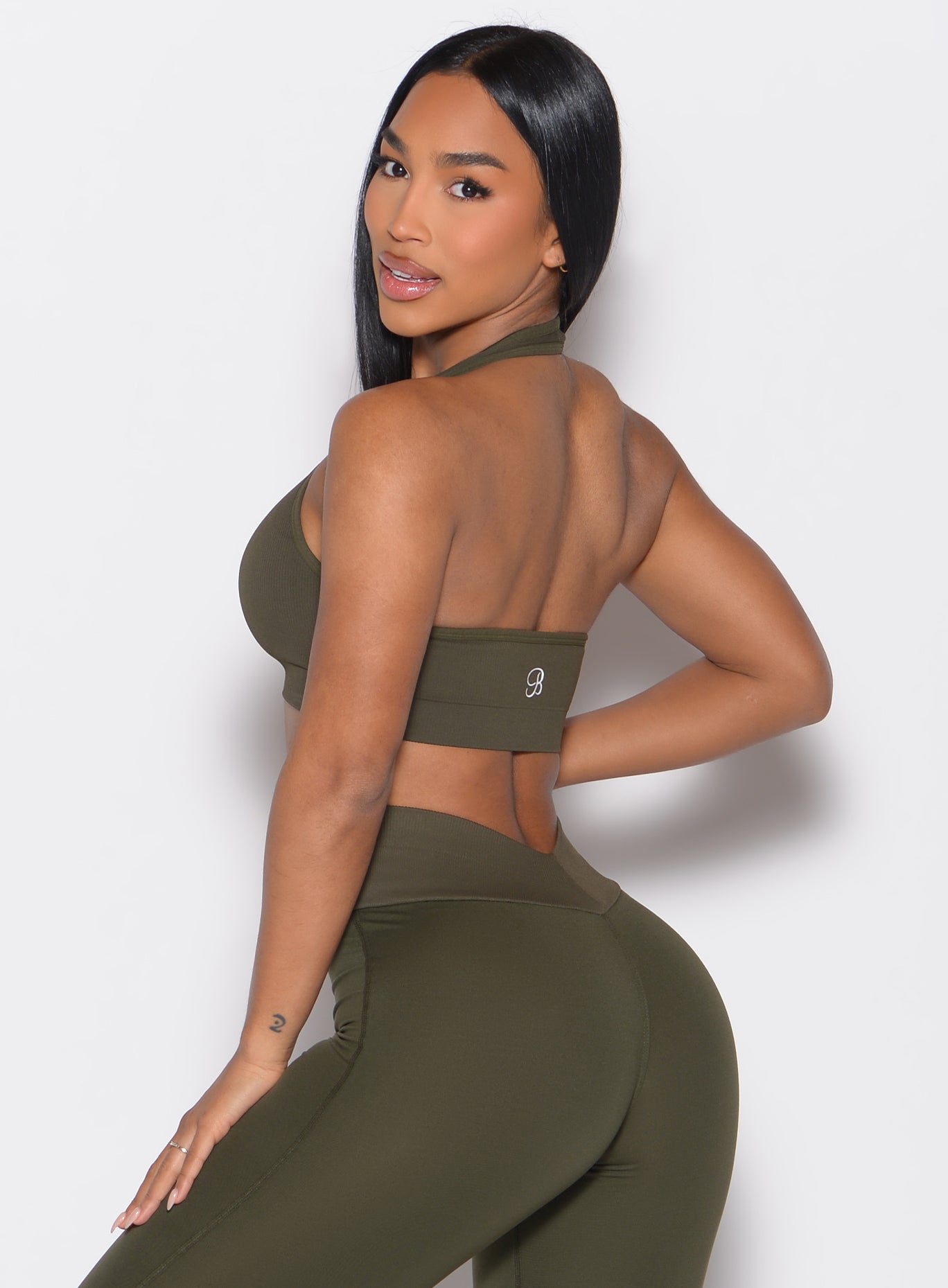 Forest Night Rib Backless Bra with seamless ribbed texture and a sculpting open-back gym design.