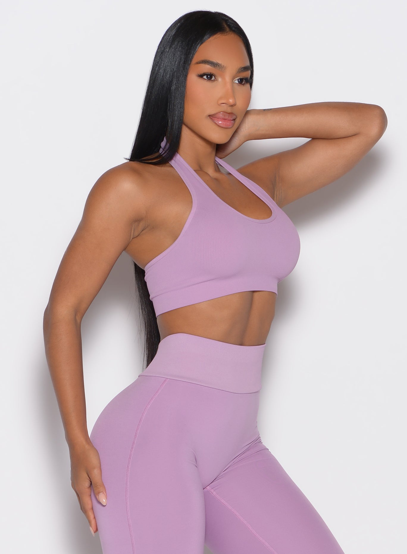 Side profile of the Smokey Grape Rib Backless Bra in seamless ribbed fabric for sculpted gym sets.