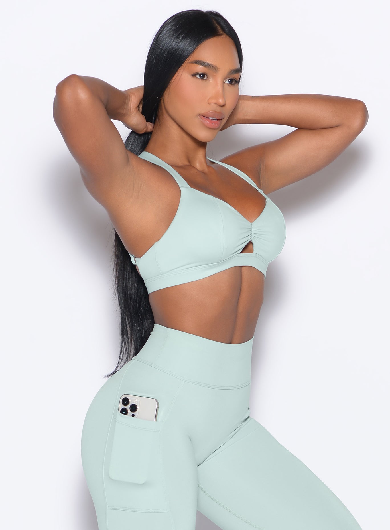 Mist Sweetheart Sports Bra with a front keyhole and cinched center for high-performance gym style.