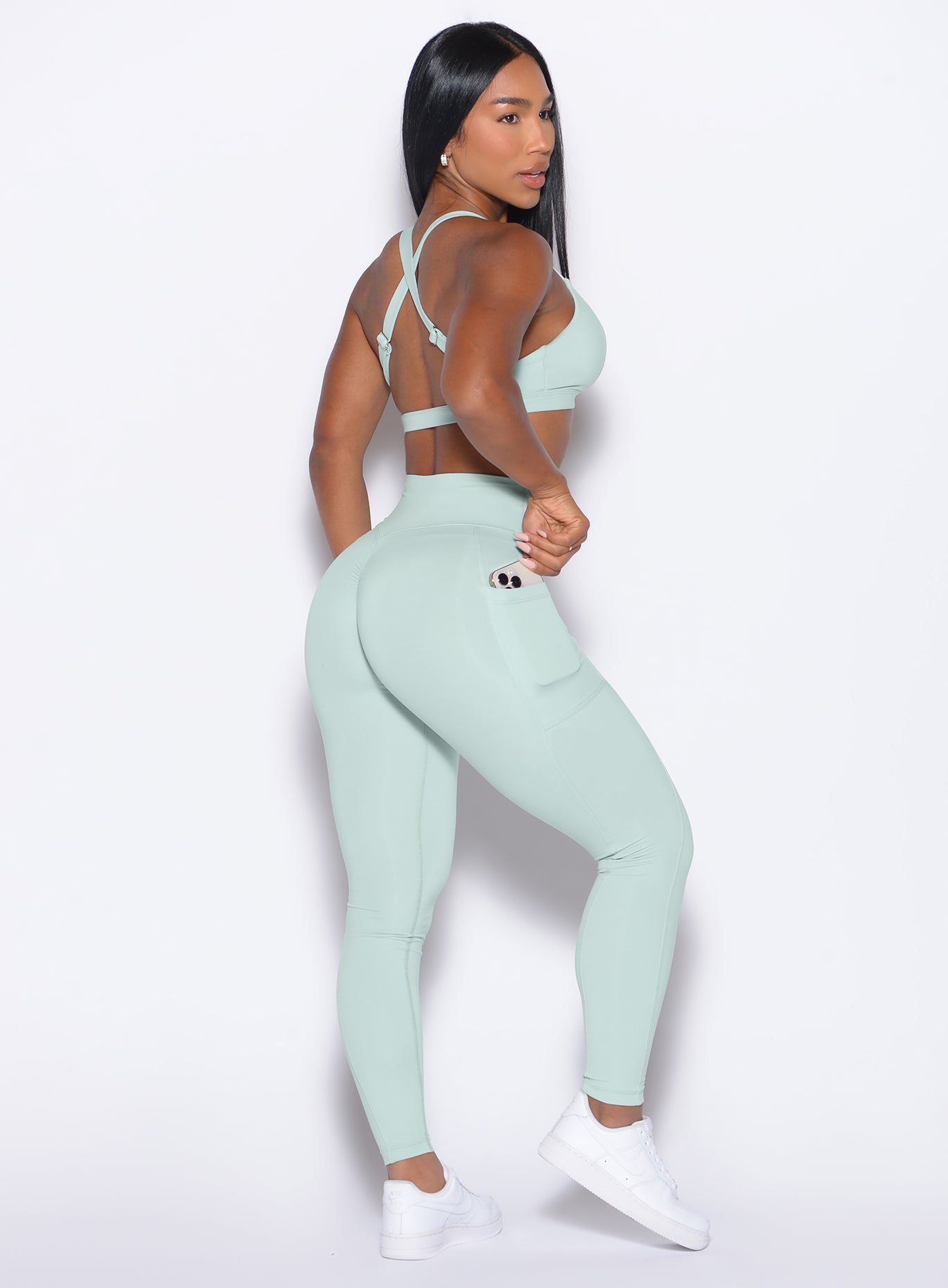 Mist Define Leggings featuring high-waisted support, side pockets, and a signature sculpting scrunch.