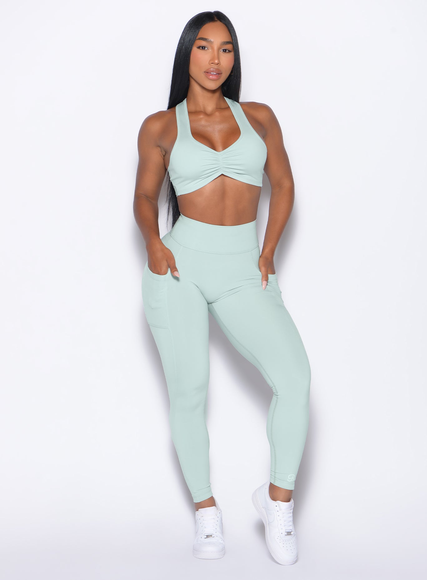 Mist Define Leggings featuring functional side pockets and a high-waisted fit for sculpting gym gains.