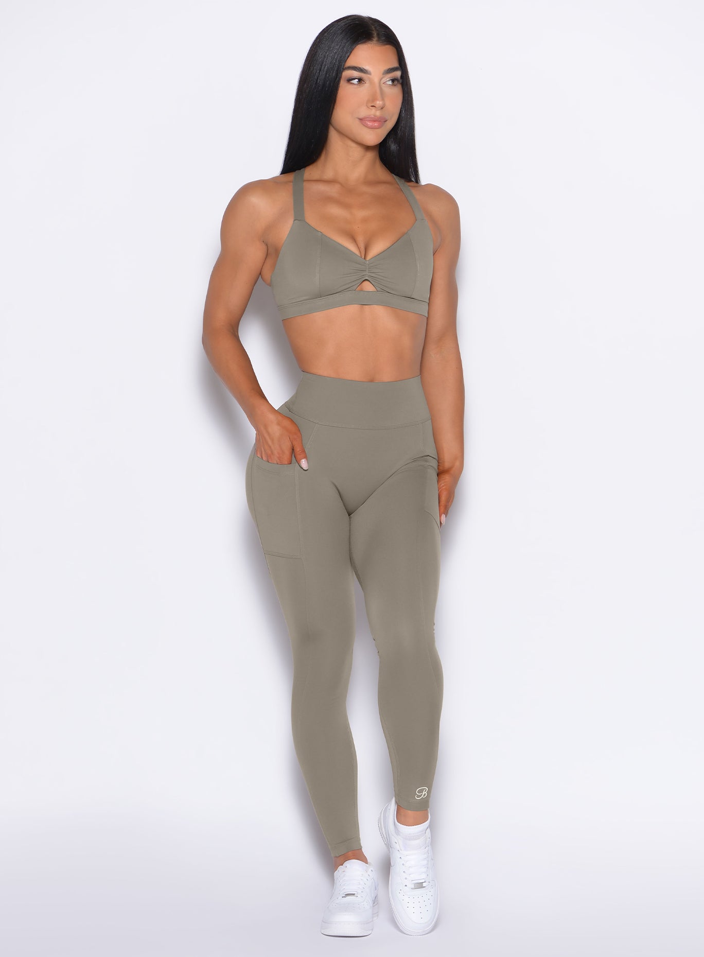 High-waist Stone Define Leggings with side pockets and a flattering sweetheart butt scrunch seam.
