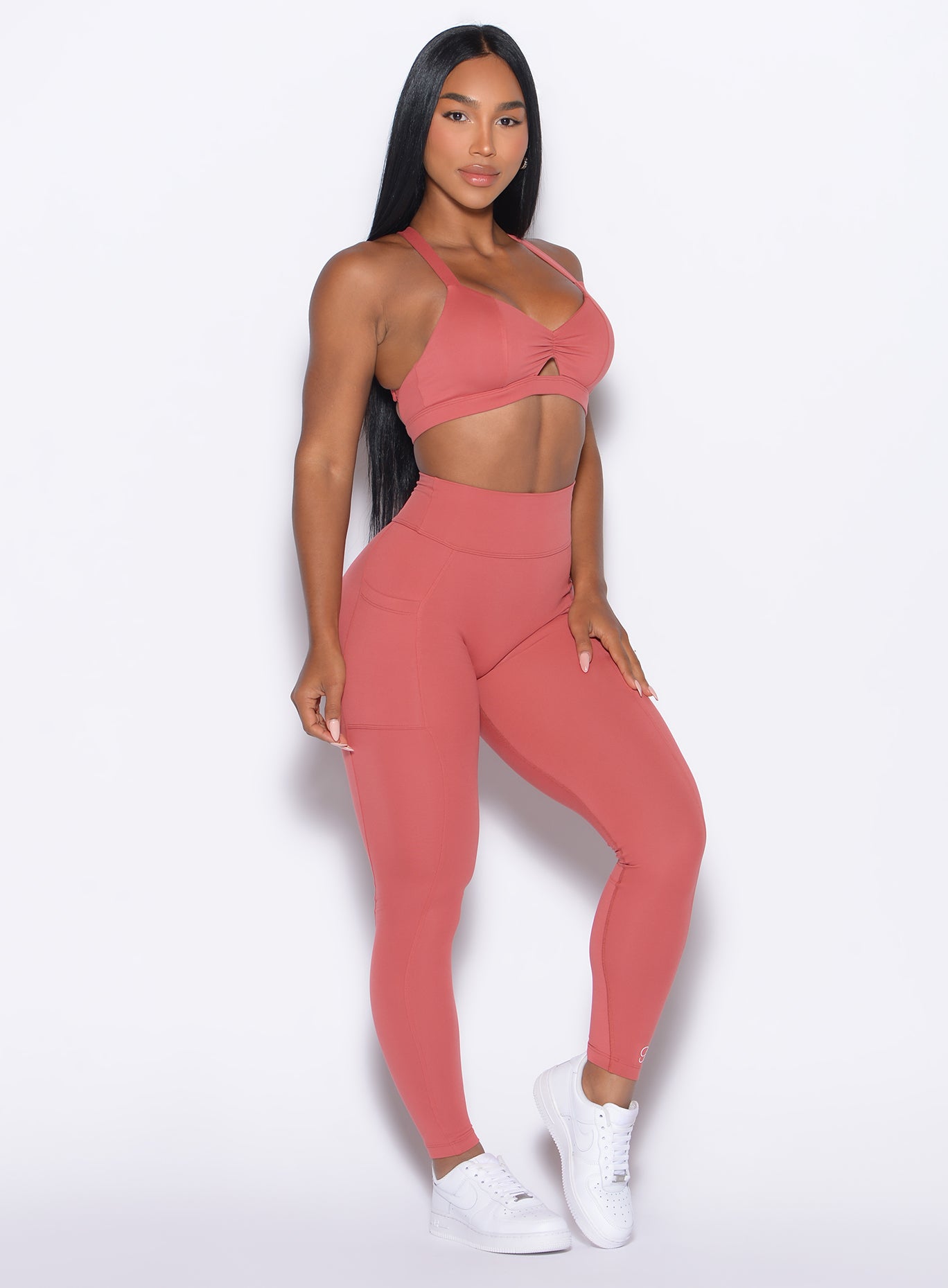 Terracotta Define Leggings with a sculpting scrunch butt, side pockets, and high-waist support.