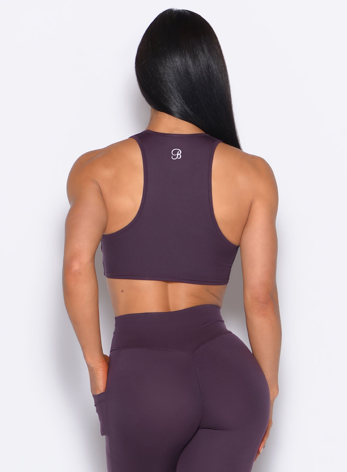 Plum Noir Scrunch Tank Bra with a sleek racerback and medium support for high-intensity training.
