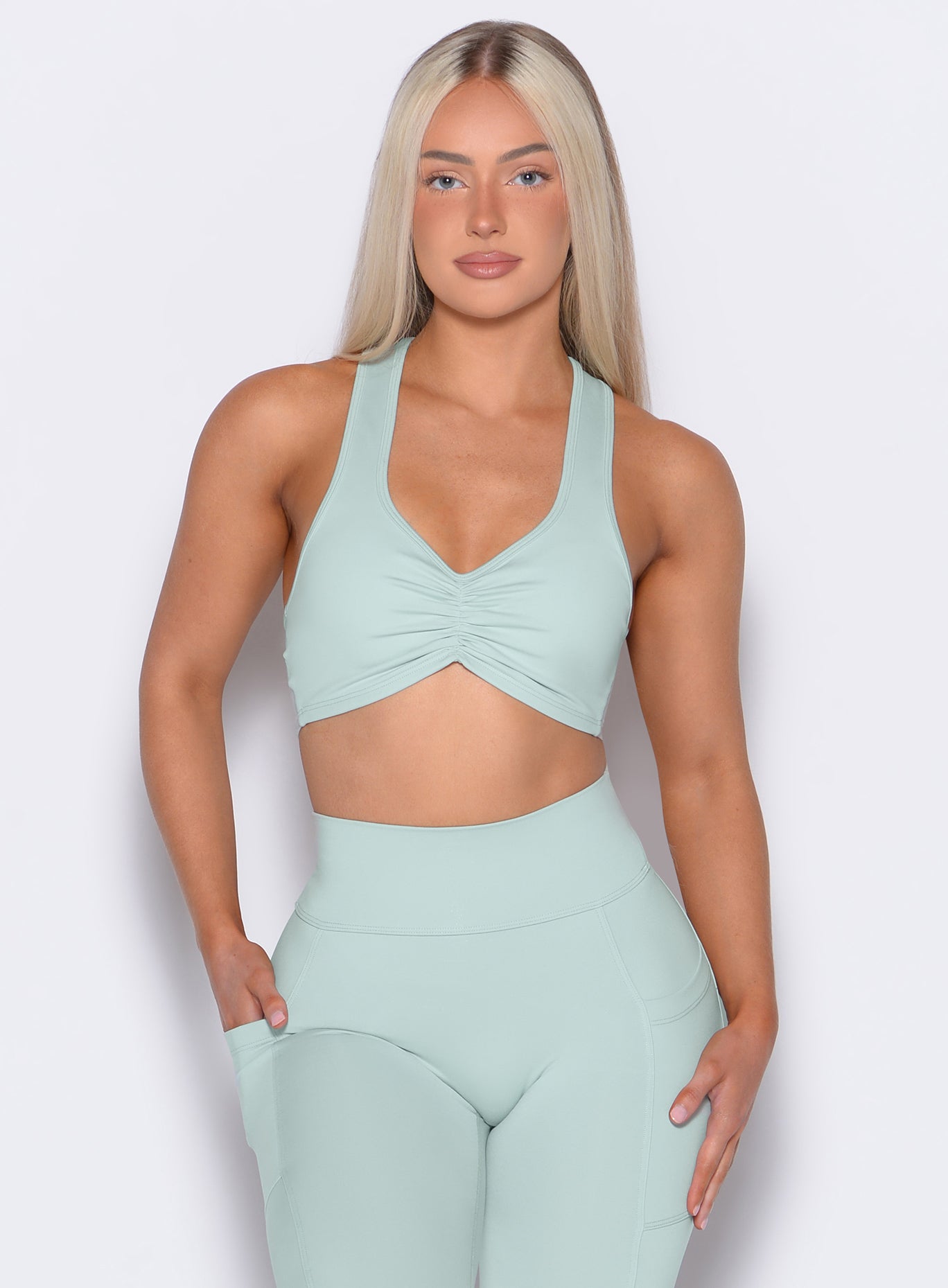 Mist Scrunch Tank Bra with a ruched front and racerback, perfect for sculpting everyday gym style.