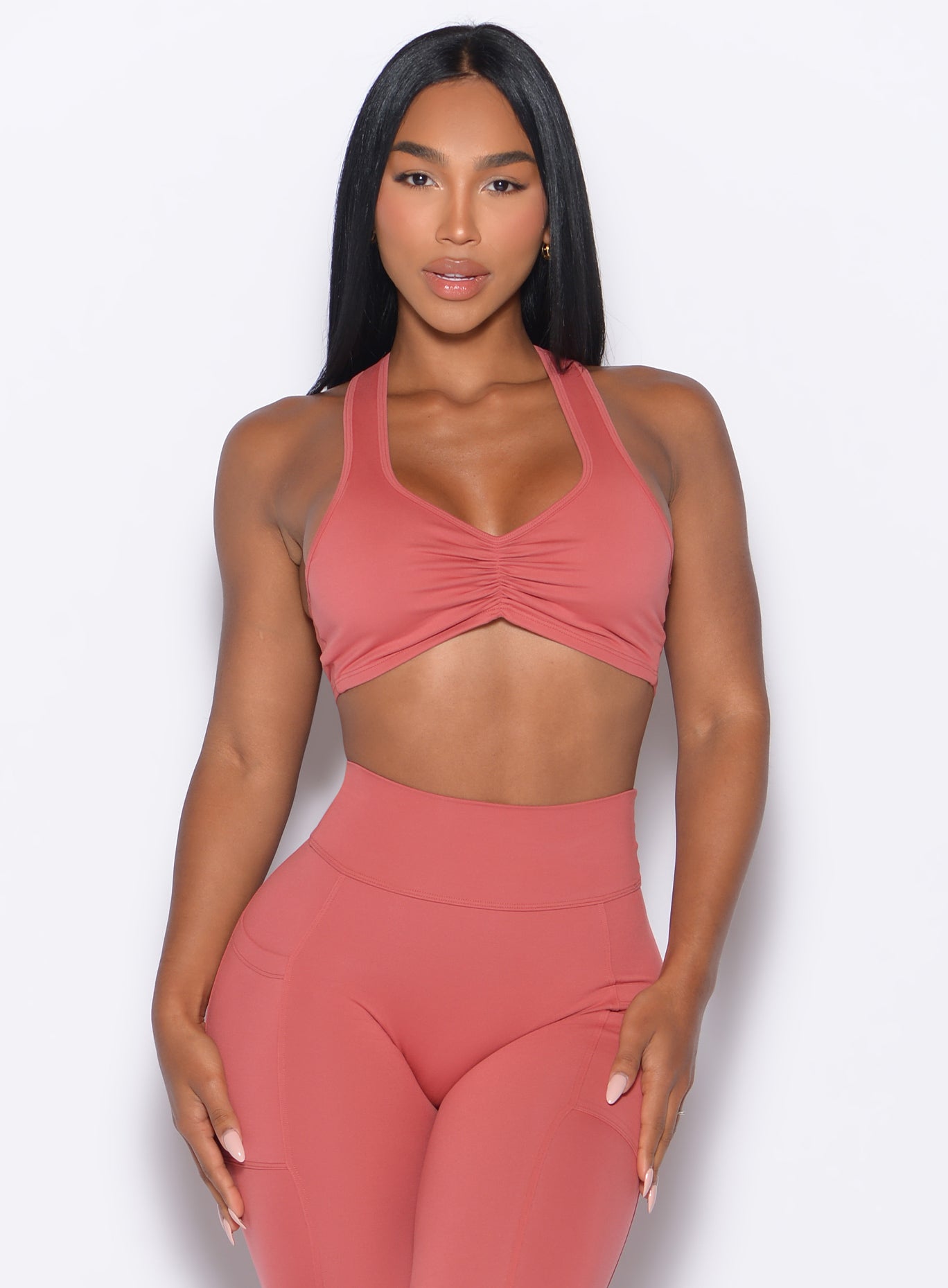 Terracotta Scrunch Tank Bra with a ruched front hem and racerback for sculpted gym performance.
