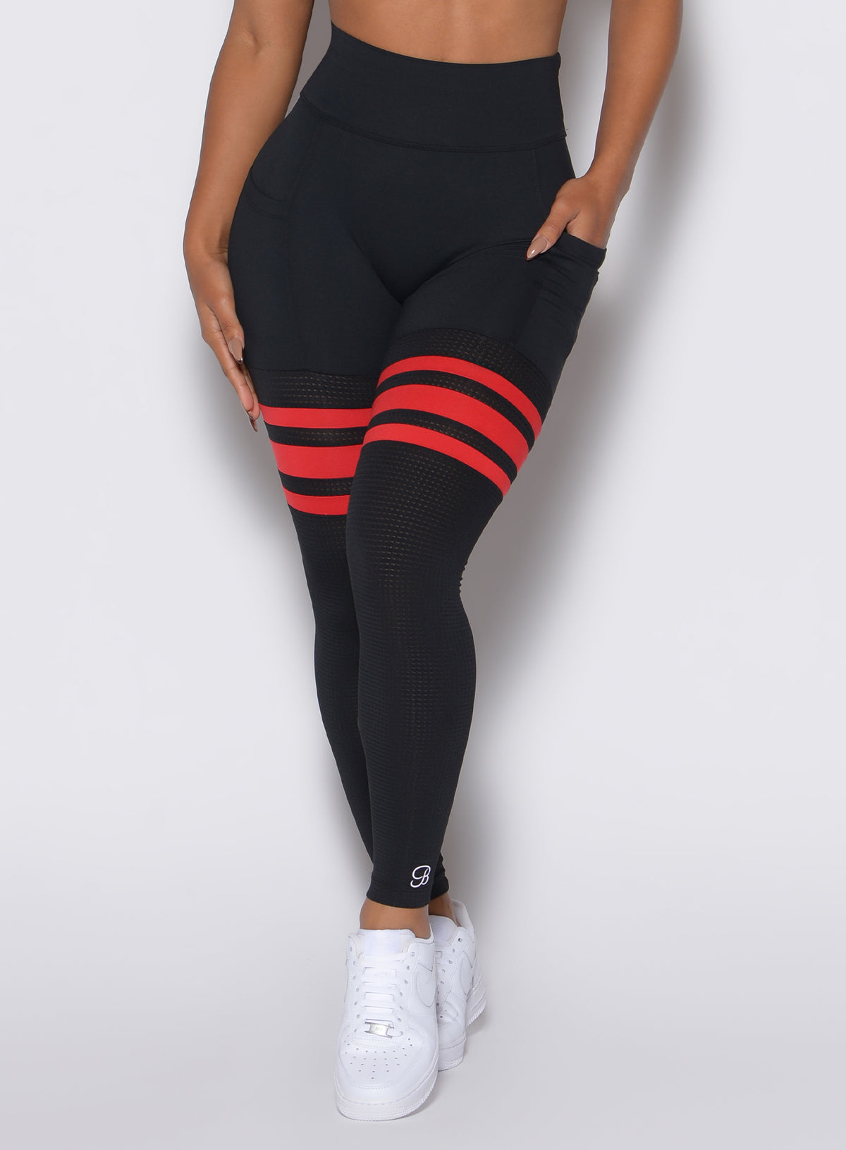 Black Fire Scrunch Thigh-Highs; breathable red mesh panels and a high-waisted, sculpted gym fit.