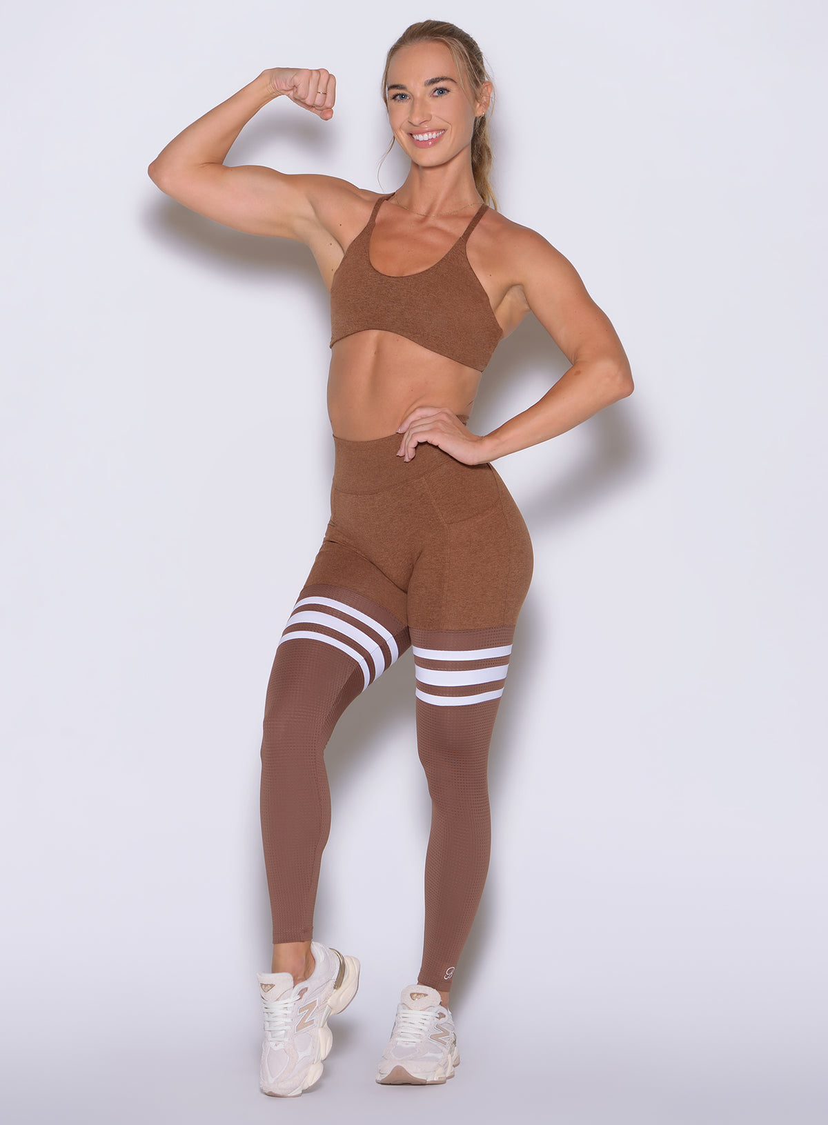 Second-skin Coffee Bean workout leggings with core control band and embroidered ankle logo.