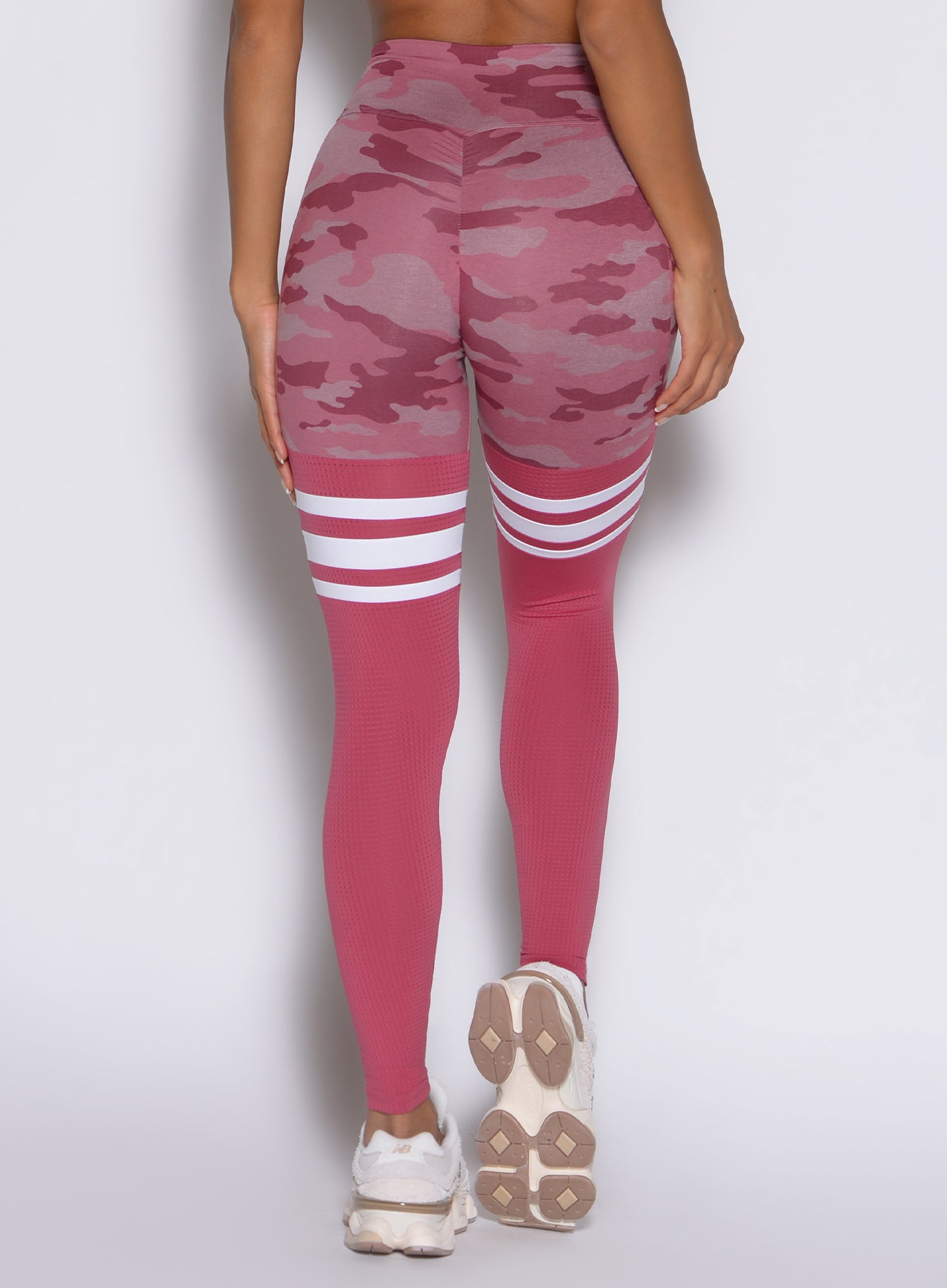 close up back side view of a model wearing the Scrunch Thigh Highs in Hibiscus camo color