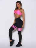 Side profile of neon pink Scrunch Thigh-Highs with breathable mesh and side pockets.
