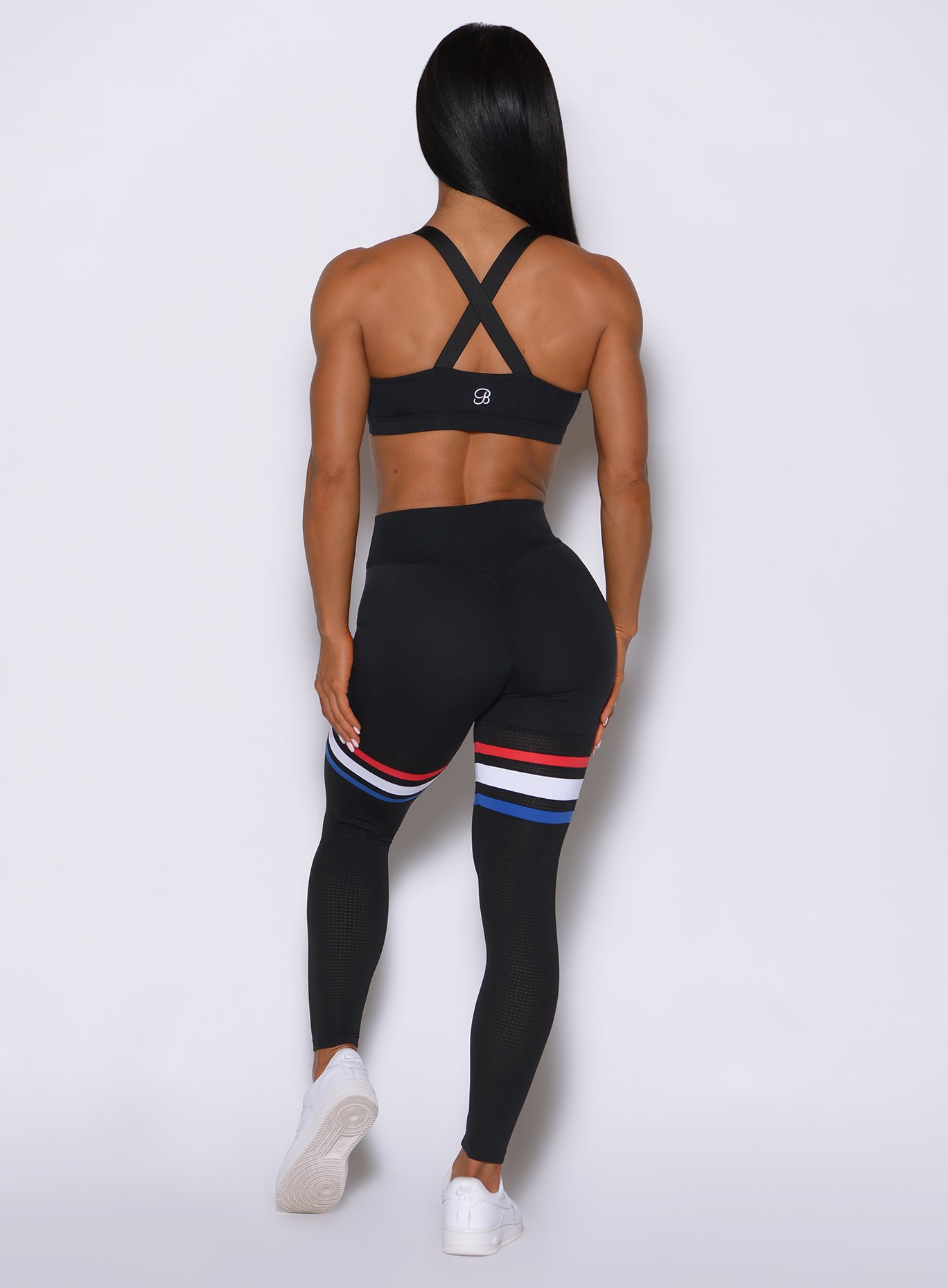 Sculpting black Scrunch Thigh-Highs with breathable mesh and a supportive V-cut back.