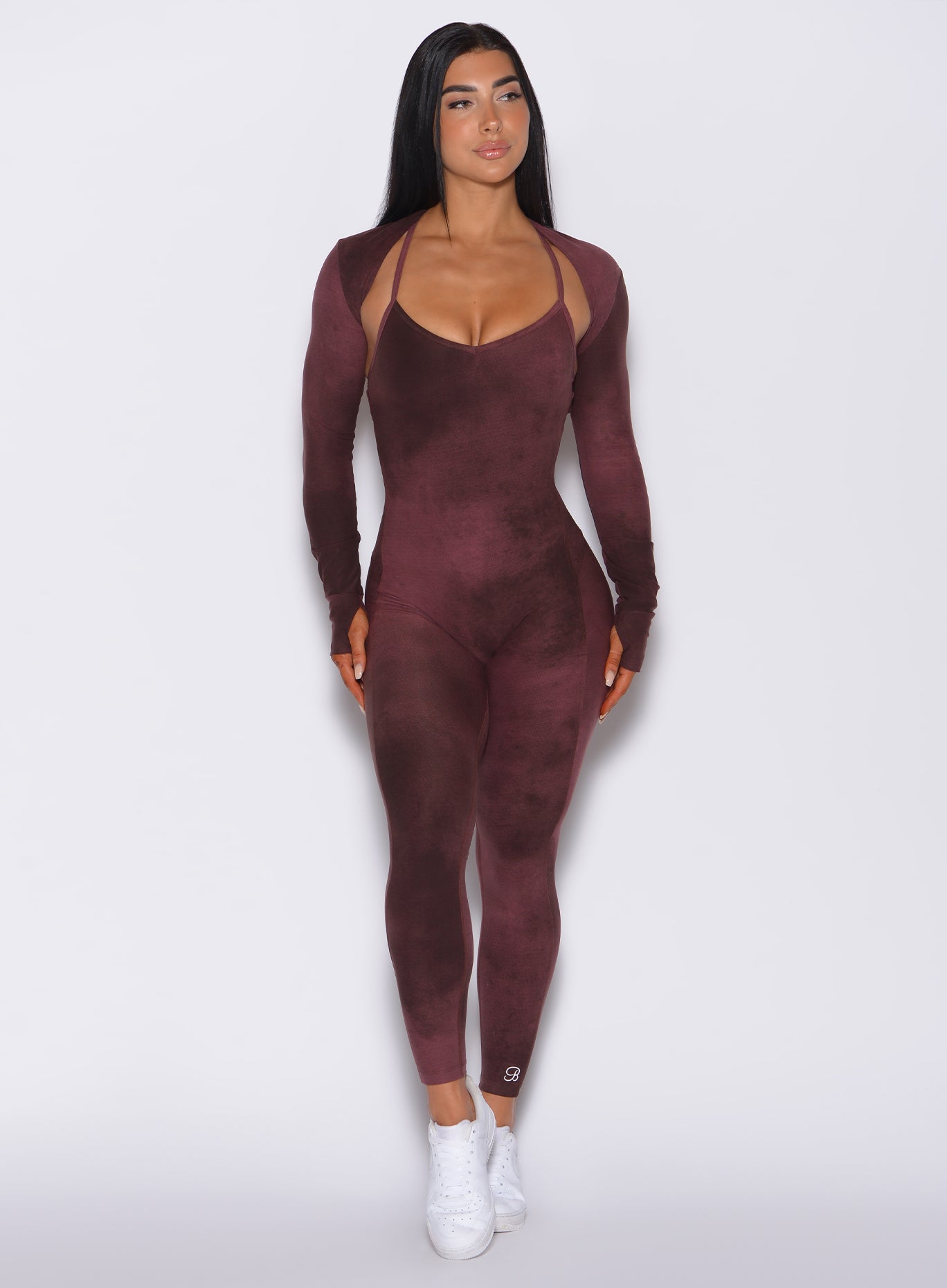 Front profile view of a model in our Sculpt Bodysuit in Vintage Port color along with the matching shape shrug