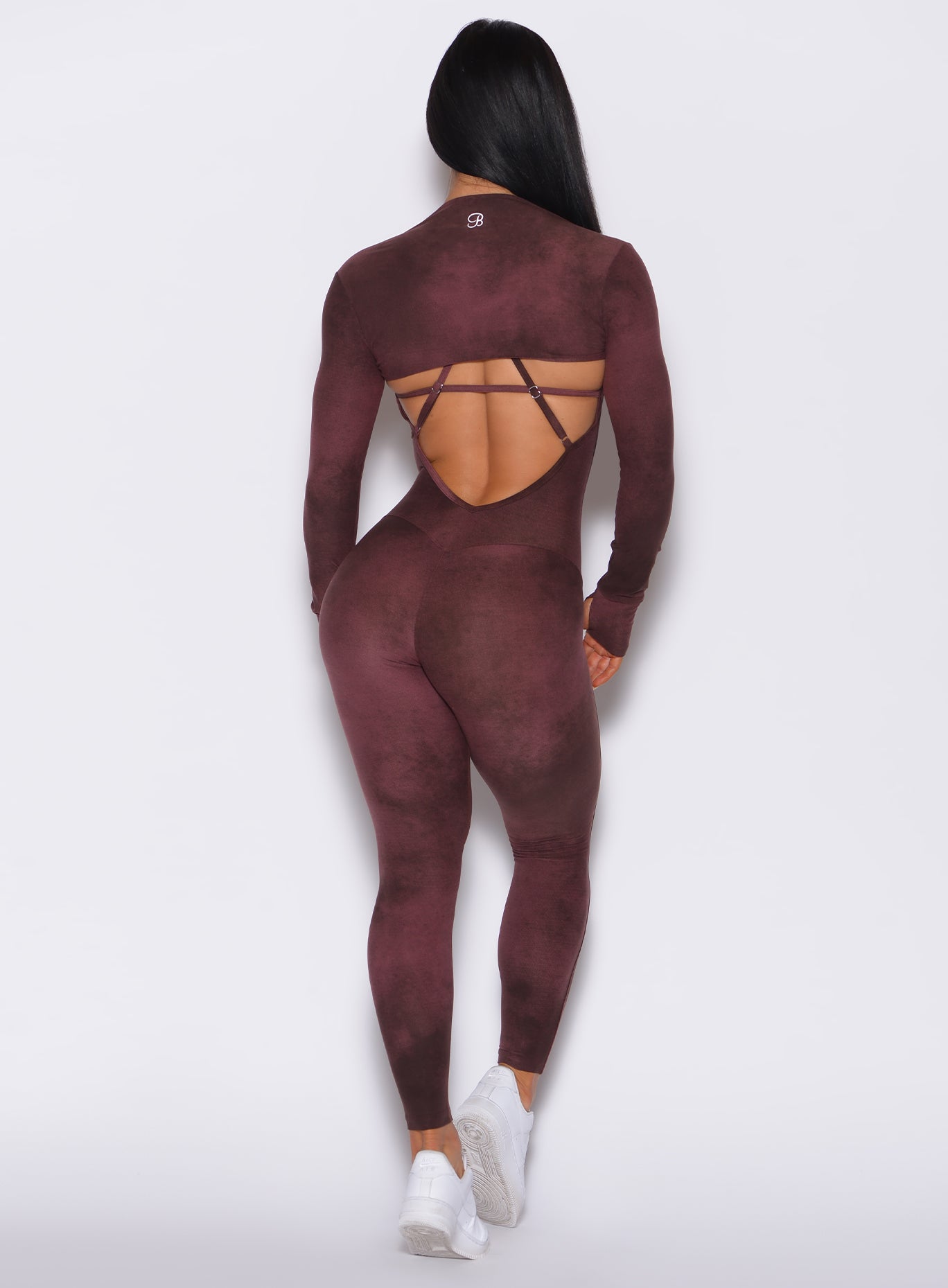 Back profile view of a model in our Sculpt Bodysuit in Vintage Port color along with the matching shape shrug
