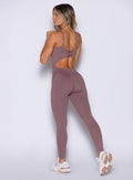 Mauve Sculptura Bodysuit featuring a fixed lace-up back and targeted seams for a snatched gym fit.