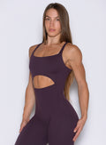 close up front view of a model wearing the Sculptura Bodysuit in plum noir color
