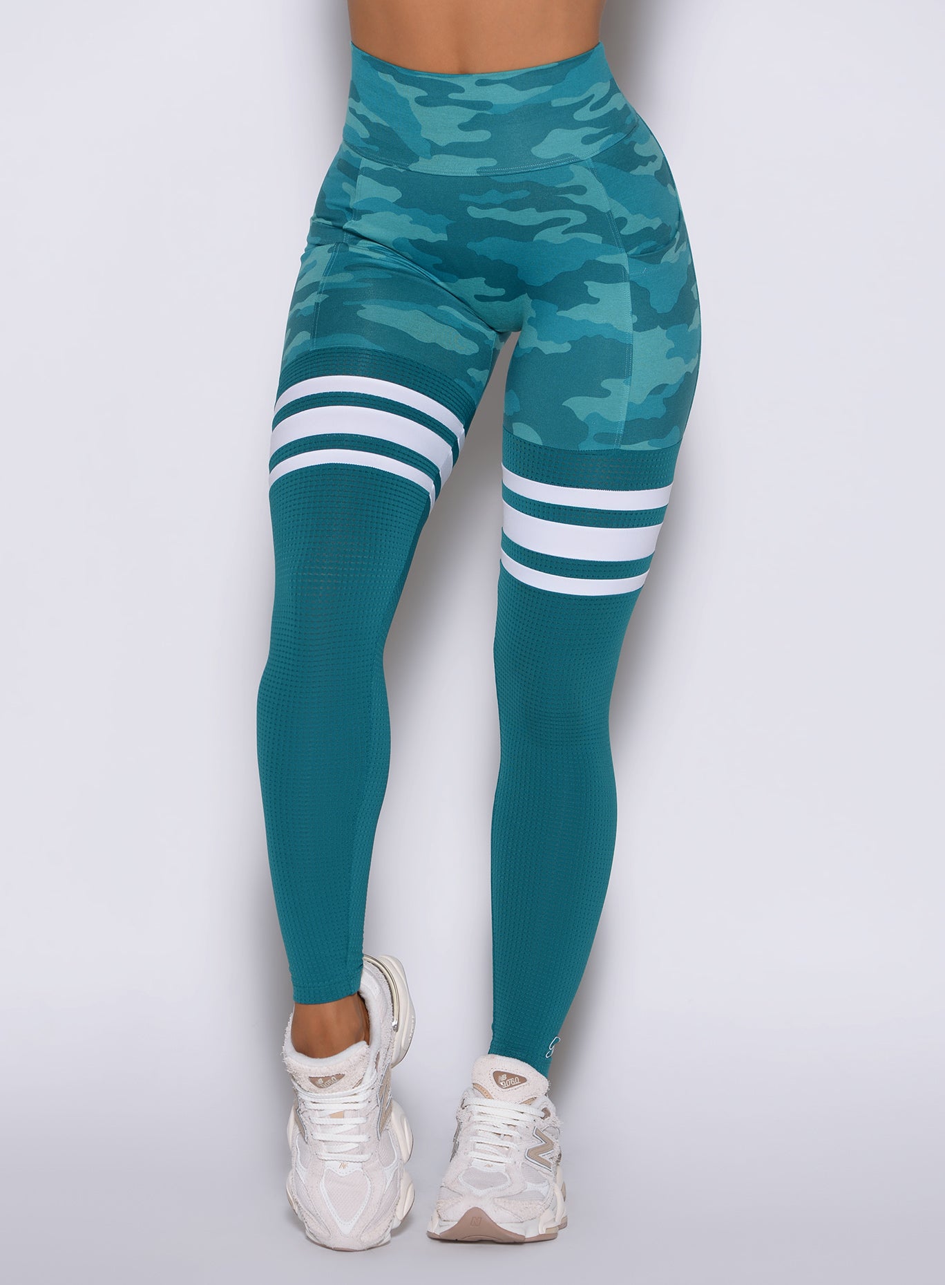 Teal Camo Scrunch Thigh-Highs with breathable mesh and side pockets for a sculpted gym fit.