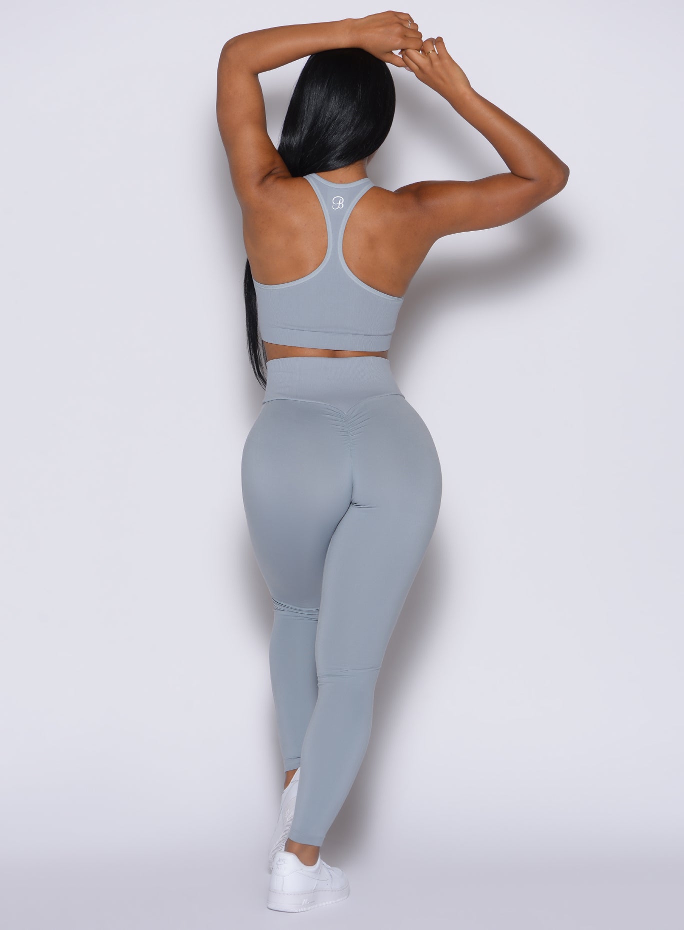 Sculpting Carbon Figure Scrunch Leggings with a snatched ribbed waistband for a flawless gym fit.