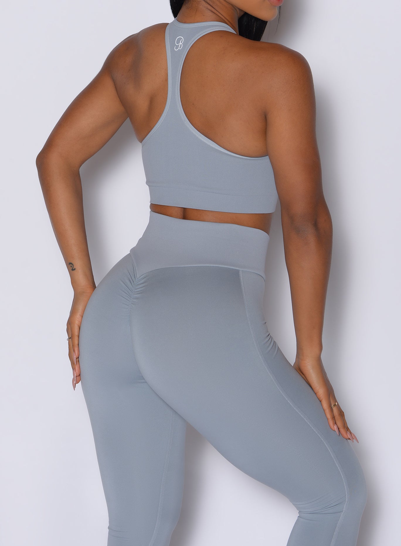 Carbon Figure Scrunch Leggings with a booty-contoured fit and ribbed waist for a sculpted gym look.