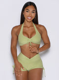 front view of a model wearing the Dual Charm Bra in serpentine color