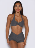 frontal view of a model wearing the Dual Charm Bra in steel shadow color