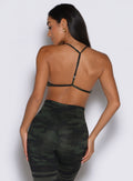 Back view of the Green/Black Camo She Owns It Bra featuring a strappy design and performance fabric.